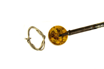 Soldering iron and rosin isolated on white background