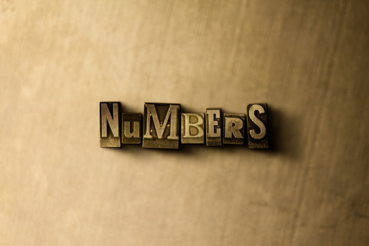 NUMBERS - close-up of grungy vintage typeset word on metal backdrop. Royalty free stock - 3D rendered stock image.  Can be used for online banner ads and direct mail.