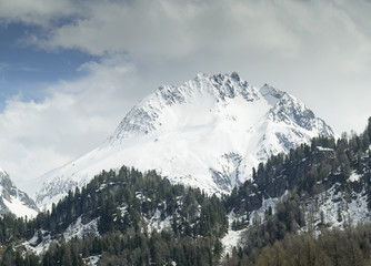 snowed mountain peak in Alpine