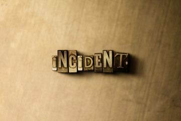 INCIDENT - close-up of grungy vintage typeset word on metal backdrop. Royalty free stock - 3D rendered stock image.  Can be used for online banner ads and direct mail.