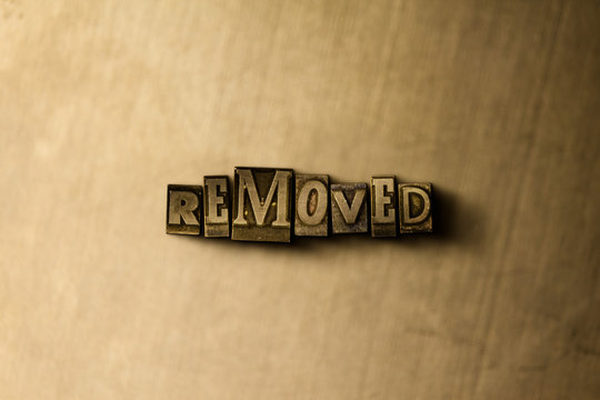 REMOVED - close-up of grungy vintage typeset word on metal backdrop. Royalty free stock - 3D rendered stock image.  Can be used for online banner ads and direct mail.