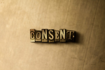CONSENT - close-up of grungy vintage typeset word on metal backdrop. Royalty free stock - 3D rendered stock image.  Can be used for online banner ads and direct mail.