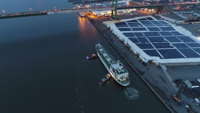 Aerial Footage of Tugboat's Guiding a Reefer into Port Philadelphia PA