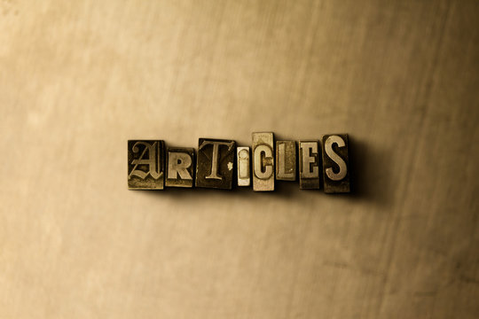ARTICLES - close-up of grungy vintage typeset word on metal backdrop. Royalty free stock - 3D rendered stock image.  Can be used for online banner ads and direct mail.