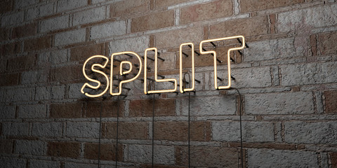 SPLIT - Glowing Neon Sign on stonework wall - 3D rendered royalty free stock illustration.  Can be used for online banner ads and direct mailers..