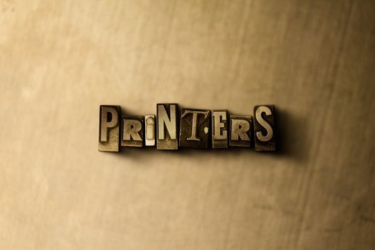 PRINTERS - close-up of grungy vintage typeset word on metal backdrop. Royalty free stock - 3D rendered stock image.  Can be used for online banner ads and direct mail.