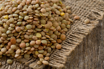 lentils on wooden surface