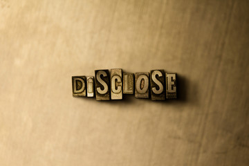 DISCLOSE - close-up of grungy vintage typeset word on metal backdrop. Royalty free stock - 3D rendered stock image.  Can be used for online banner ads and direct mail.