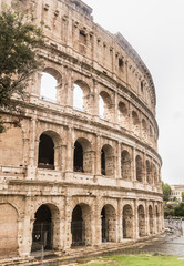 Fototapeta na wymiar The stone walls of the Colosseum. Rome, Italy