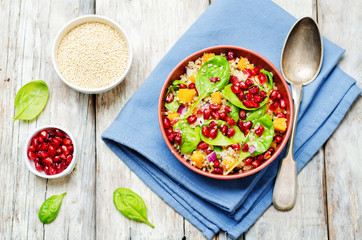 Pomegranate sweet potato quinoa spinach salad