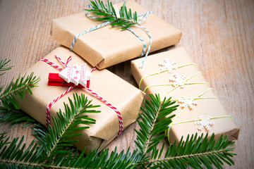 Christmas presents on wooden background, retro style with copy space