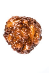 Frosted apple fritter isolated on a white background