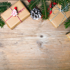 Christmas presents on wooden background, retro style with copy space