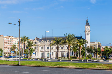 Fototapeta na wymiar Port Authority buildings with clock tower in the harbor of Vale