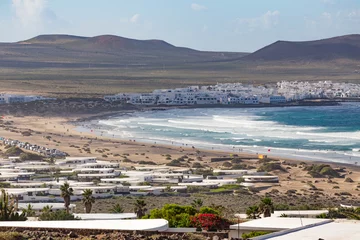 Fotobehang Caleta de Famara, in Lanzarote, Canary Islands © NICOLA