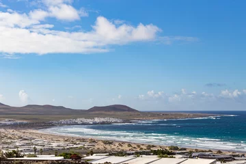 Fotobehang Caleta de Famara, in Lanzarote, Canary Islands © NICOLA