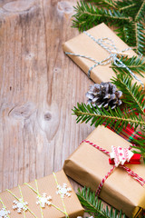 Christmas presents on wooden background, retro style with copy space