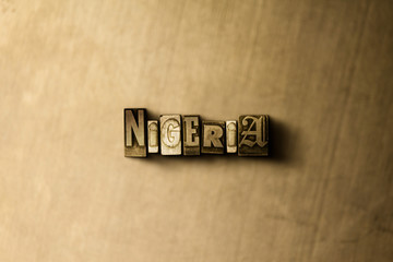 NIGERIA - close-up of grungy vintage typeset word on metal backdrop. Royalty free stock - 3D rendered stock image.  Can be used for online banner ads and direct mail.