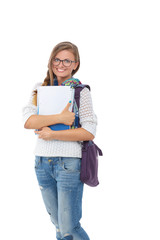 Portrait of a young student woman holding exercise books.