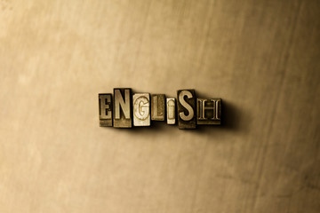 ENGLISH - close-up of grungy vintage typeset word on metal backdrop. Royalty free stock - 3D rendered stock image.  Can be used for online banner ads and direct mail.