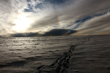 Footprints in the snow. Winter hiking.