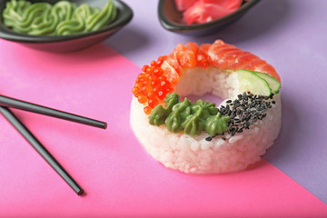 Sushi doughnut on color background