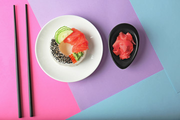 Sushi doughnut on colorful background