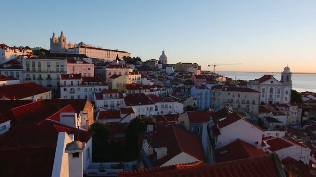 Portugal, Lisbon, Miradouro das Portas do Sol, View over Alfama Neighbourhood at sunrise.
