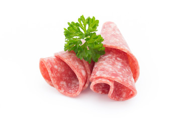 Salami sausage slices isolated on white background.