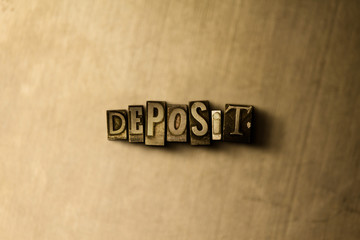 DEPOSIT - close-up of grungy vintage typeset word on metal backdrop. Royalty free stock - 3D rendered stock image.  Can be used for online banner ads and direct mail.