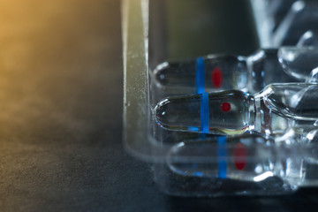 medical ampoule macro on gray