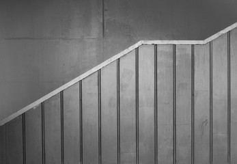 Profile view of metal sided stairs in black and white