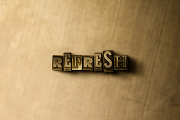 REFRESH - close-up of grungy vintage typeset word on metal backdrop. Royalty free stock - 3D rendered stock image.  Can be used for online banner ads and direct mail.