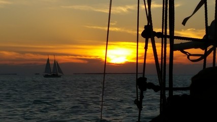 Sunset on the Ocean From A Sailboat In Twilight In Key West Florida