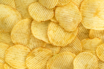 Potato chips, food background, top view