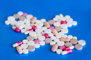Medical cross made of pills, capsules and tablets