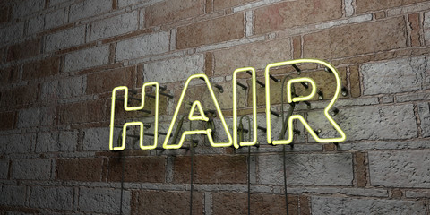 HAIR - Glowing Neon Sign on stonework wall - 3D rendered royalty free stock illustration.  Can be used for online banner ads and direct mailers..