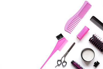 preparations for styling hair on white background top view