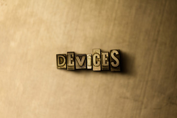 DEVICES - close-up of grungy vintage typeset word on metal backdrop. Royalty free stock - 3D rendered stock image.  Can be used for online banner ads and direct mail.