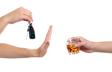 Woman with car key refusing glass of alcoholic beverage, on white background. Don't drink and drive concept