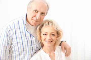 Happy senior couple at home