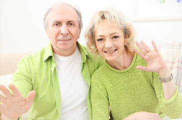 Happy senior couple at home