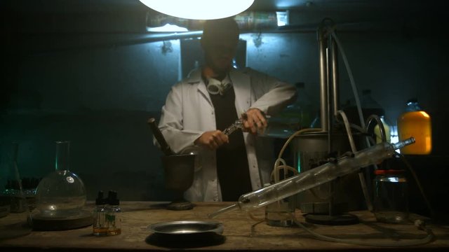 Strange scientist pours liquid in a flask