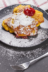Pumpkin pancake with redcurrant marmalade and sugar