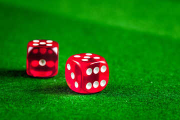 playing poker dice on green background