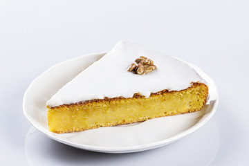 A piece of pumpkin tart on a white plate