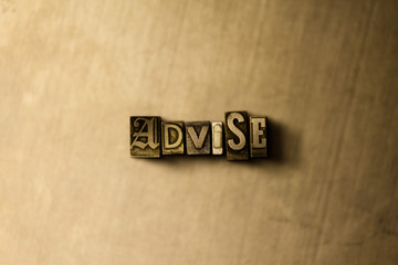 ADVISE - close-up of grungy vintage typeset word on metal backdrop. Royalty free stock - 3D rendered stock image.  Can be used for online banner ads and direct mail.