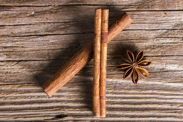 Cinnamon and anise on a wooden table