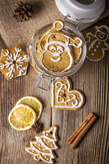 Christmas cookies with cinnamon and anise on a wooden table