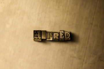 ALFRED - close-up of grungy vintage typeset word on metal backdrop. Royalty free stock - 3D rendered stock image.  Can be used for online banner ads and direct mail.